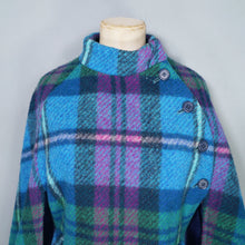 Load image into Gallery viewer, 70s JIMMY HOURIHAN "BORU" LIGHT BLUE, PINK AND GREEN PLAID WOOL CAPE - S-M