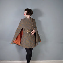 Load image into Gallery viewer, 60s BROWN PLAID TWEEDY WOOL CAPE COAT WITH MILITARY STYLE GOLD BUTTON AND BELT - S
