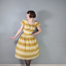 Load image into Gallery viewer, 50s MUSTARD YELLOW FLORAL SUN DRESS WITH RUCHED SHELF BUST AND PRINCESS PUFF SLEEVE - S-M
