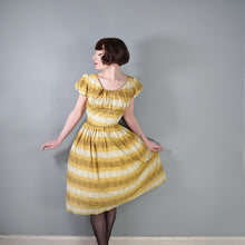 Load image into Gallery viewer, 50s MUSTARD YELLOW FLORAL SUN DRESS WITH RUCHED SHELF BUST AND PRINCESS PUFF SLEEVE - S-M