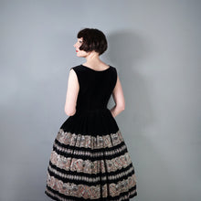 Load image into Gallery viewer, 50s FULL SKIRTED BLACK VELVET EVENING DRESS WITH BORDER PATTERN FULL SKIRT - S
