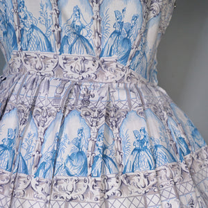 50s PALE BLUE NOVELTY DRESS IN ROMANTIC LADY AND COURTIER PRINT - XS-S