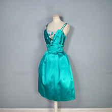 Load image into Gallery viewer, 60s BLANES GREEN SATIN COCKTAIL DRESS WITH FLORAL APPLIQUE BUST - S