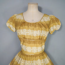 Load image into Gallery viewer, 50s MUSTARD YELLOW FLORAL SUN DRESS WITH RUCHED SHELF BUST AND PRINCESS PUFF SLEEVE - S-M