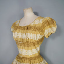 Load image into Gallery viewer, 50s MUSTARD YELLOW FLORAL SUN DRESS WITH RUCHED SHELF BUST AND PRINCESS PUFF SLEEVE - S-M