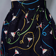 Load image into Gallery viewer, 70s 80s BLACK NOVELTY BAR SCENE BORDER PRINT SKIRT WITH LADIES WITH COCKTAILS - 27"