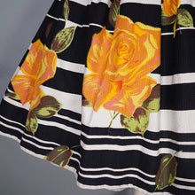 Load image into Gallery viewer, 60s BLACK STRIPE AND HUGE ORANGE ROSE PRINT FULL SKIRT - 26.5&quot;