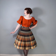 Load image into Gallery viewer, 50s SPORTRITE REVERSIBLE PLEATED RUST AND BLACK TARTAN PLAID WOOL SKIRT - 26.5"