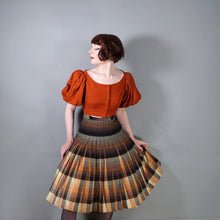 Load image into Gallery viewer, 50s SPORTRITE REVERSIBLE PLEATED RUST AND BLACK TARTAN PLAID WOOL SKIRT - 26.5"