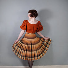 Load image into Gallery viewer, 50s SPORTRITE REVERSIBLE PLEATED RUST AND BLACK TARTAN PLAID WOOL SKIRT - 26.5"