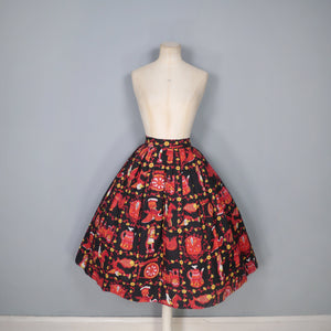 50s NOVELTY SKIRT IN BLACK AND RED WITH ORNAMENT / FIGURINE PRINT - 26"
