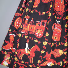 Load image into Gallery viewer, 50s NOVELTY SKIRT IN BLACK AND RED WITH ORNAMENT / FIGURINE PRINT - 26&quot;
