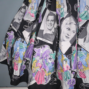 BLACK 50s 60s NOVELTY SKIRT IN THEATRICAL PRINT WITH HOLLYWOOD STARS - 25"