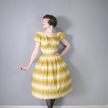 Load image into Gallery viewer, 50s MUSTARD YELLOW FLORAL SUN DRESS WITH RUCHED SHELF BUST AND PRINCESS PUFF SLEEVE - S-M