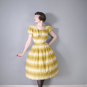 50s MUSTARD YELLOW FLORAL SUN DRESS WITH RUCHED SHELF BUST AND PRINCESS PUFF SLEEVE - S-M