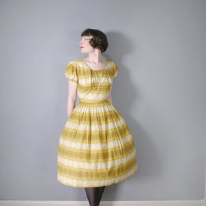 50s MUSTARD YELLOW FLORAL SUN DRESS WITH RUCHED SHELF BUST AND PRINCESS PUFF SLEEVE - S-M