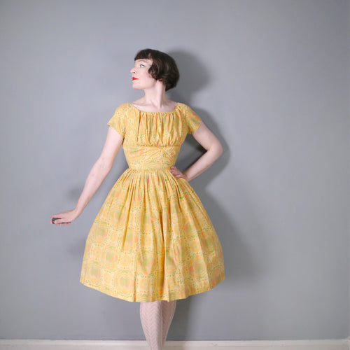 PASTEL YELLOW-ORANGE 50s 60s FLORAL DRESS WISH GATHERED SHELF BUST AND FULL SKIRT - XS