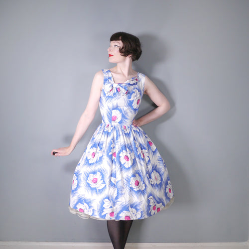 50s BLUE WHITE FLORAL COTTON DAY DRESS WITH ASYMMETRIC NECKLINE AND BOW - S