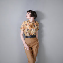 Load image into Gallery viewer, 70s SMOKING DECO LADY NOVELTY PRINT ORANGE PUSSYBOW SHIRT BLOUSE - S-M