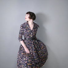 Load image into Gallery viewer, 50s BLACK FLORAL SHIRTWAISTER FULL SKIRT DRESS WITH CROSS STITCH PRINT - S