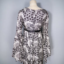 Load image into Gallery viewer, 60s 70s JEAN VARON BLACK AND WHITE DRESS WITH PLUNGE NECK AND HUGE BELL SLEEVE - M