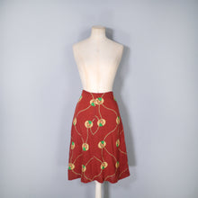 Load image into Gallery viewer, 70s does ART DECO NOVELTY RUST LADY PORTRAIT PATTERN KNIT SKIRT - M-L