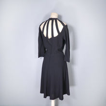 Load image into Gallery viewer, 50s RUTH LYONS AUTOGRAPH BLACK RAYON LADDER CUT OUT NECKLINE LBD DRESS - M