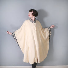 Load image into Gallery viewer, 70s &quot;EPSILON&quot; CREAM WOOL CAPE / BLANKET COAT WITH GREY CHECK TRIM - ONE SIZE