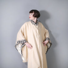 Load image into Gallery viewer, 70s &quot;EPSILON&quot; CREAM WOOL CAPE / BLANKET COAT WITH GREY CHECK TRIM - ONE SIZE