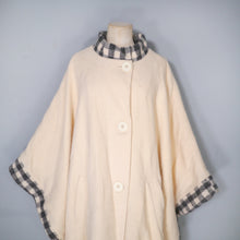 Load image into Gallery viewer, 70s &quot;EPSILON&quot; CREAM WOOL CAPE / BLANKET COAT WITH GREY CHECK TRIM - ONE SIZE