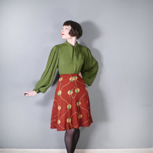 Load image into Gallery viewer, 70s does ART DECO NOVELTY RUST LADY PORTRAIT PATTERN KNIT SKIRT - M-L