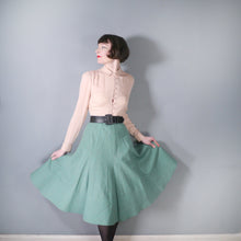 70s DERBERS LIGHT GREEN TWEEDY WOOL FLARED SKIRT WITH QUILTED HEM 26 Sartorial Matters