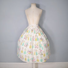 Load image into Gallery viewer, 50s PASTEL NOVELTY SKIRT WITH BUTTERFLIES, MANDOLINS AND FRUIT BASKETS - 24&quot;