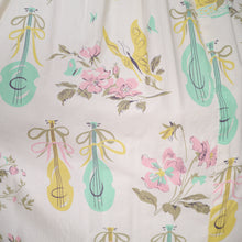 Load image into Gallery viewer, 50s PASTEL NOVELTY SKIRT WITH BUTTERFLIES, MANDOLINS AND FRUIT BASKETS - 24&quot;