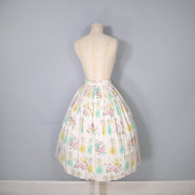 Load image into Gallery viewer, 50s PASTEL NOVELTY SKIRT WITH BUTTERFLIES, MANDOLINS AND FRUIT BASKETS - 24&quot;