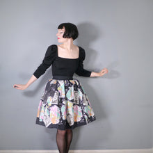 Load image into Gallery viewer, BLACK 50s 60s NOVELTY SKIRT IN THEATRICAL PRINT WITH HOLLYWOOD STARS - 27-28&quot;