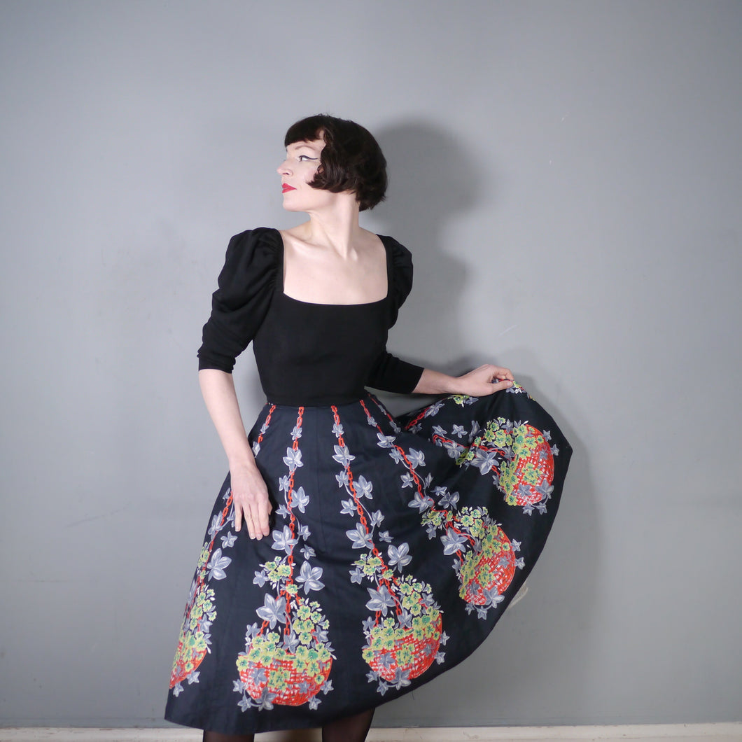 FANTASTIC 50s FLOWER BASKET WITH CHAIN NOVELTY BORDER PRINT BLACK COTTON SKIRT - 24