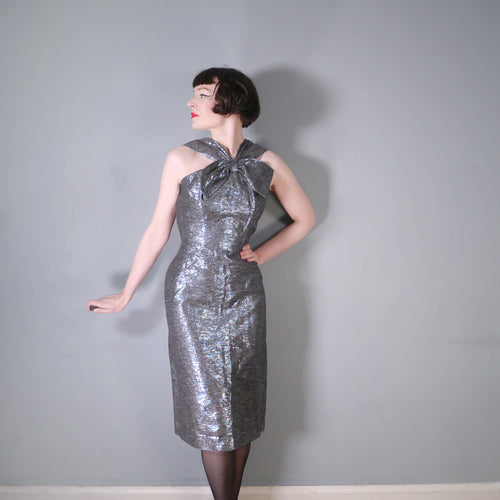 60s SPARKLY SILVER AND BLUE METALLIC FOIL WIGGLE DRESS WITH BIG NECK BOW - M