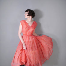Load image into Gallery viewer, 50s RED SHEER FULL SKIRTED DRESS WITH FLOCKED BOW AND FLORAL PRINT - S