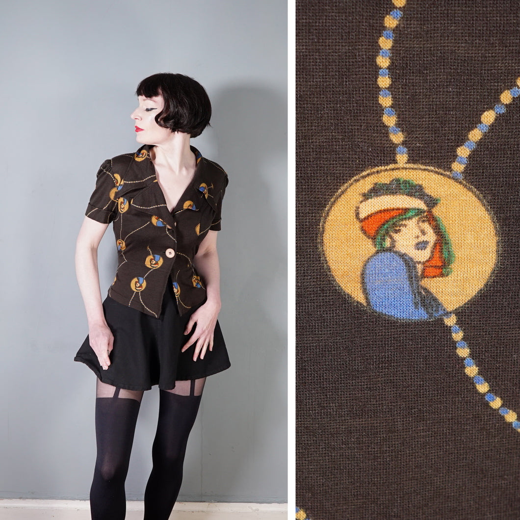 70s BROWN ART DECO LADY AMULET PRINT PUFF SLEEVE SHIRT - L