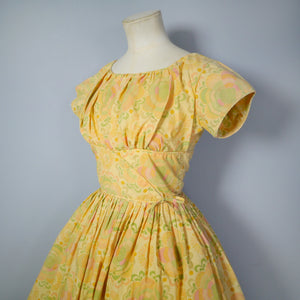PASTEL YELLOW-ORANGE 50s 60s FLORAL DRESS WISH GATHERED SHELF BUST AND FULL SKIRT - XS