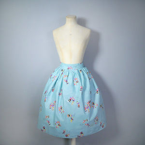 50s HANDMADE NOVELTY SKIRT IN PASTEL BLUE WITH RUSSIAN DOLL PRINT - 26"