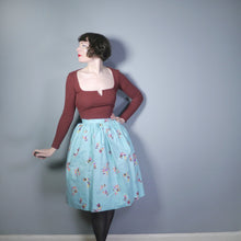 Load image into Gallery viewer, 50s HANDMADE NOVELTY SKIRT IN PASTEL BLUE WITH RUSSIAN DOLL PRINT - 26&quot;