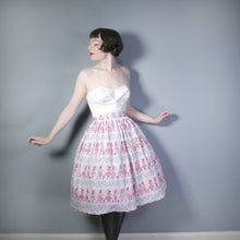 Load image into Gallery viewer, 50s PASTEL PINK LADY AND CITYSCAPE BORDER PRINT SKIRT - 28&quot;