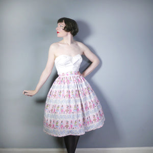 50s PASTEL PINK LADY AND CITYSCAPE BORDER PRINT SKIRT - 28"