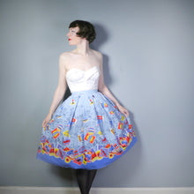 Load image into Gallery viewer, 50s NOVELTY LIGHT BLUE BORDER PRINT TRAVEL POSTER SKIRT - 25.5&quot;