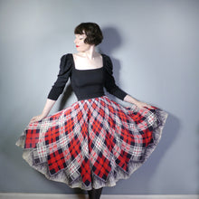 Load image into Gallery viewer, 50s RED BLACK AND WHITE TARTAN FULL CIRCLE SKIRT WITH TROMP L&#39;OEIL TASSLE HEM - 25.5&quot;