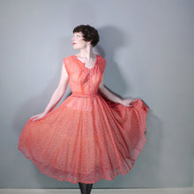 Load image into Gallery viewer, 50s RED SHEER FULL SKIRTED DRESS WITH FLOCKED BOW AND FLORAL PRINT -